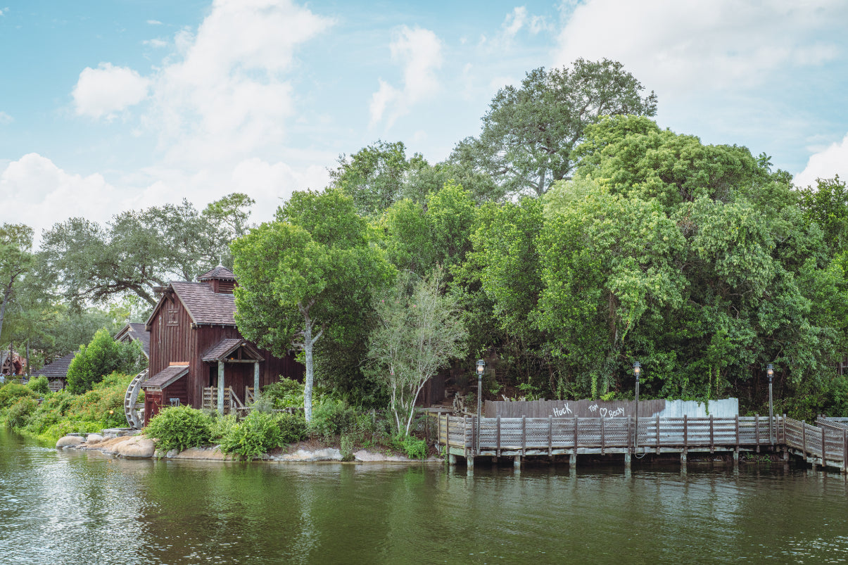 A view of Tom Sawyer Island over the water from Liberty Square.